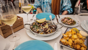 a table topped with plates of food on a plate