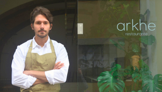 a man standing in front of a store