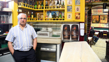 a man standing in front of a store