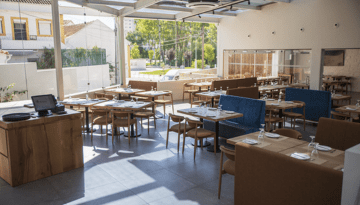 a kitchen with a dining room table