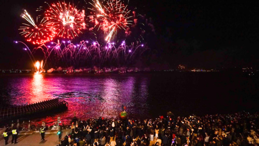 a group of fireworks in the night sky