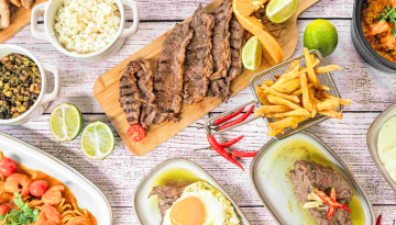 a dish is filled with different types of food on a table