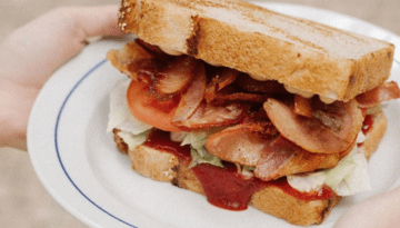 a sandwich cut in half on a plate